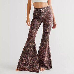 NWT Free people Just Float On Printed Flared brown/pink paisley jeans size 24